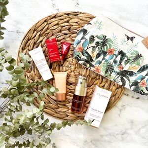 Clarins Double Serum + Day Cream, Eye Cream, Hand Cream & Makeup Bag
